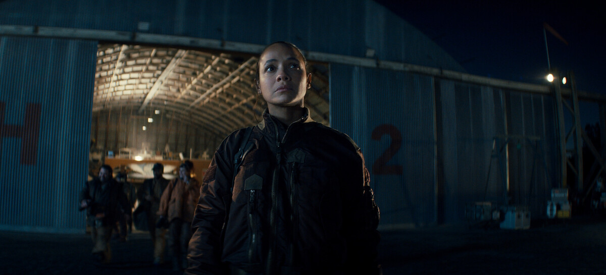 Dania Ramirez  stands in the dark as Aimee 