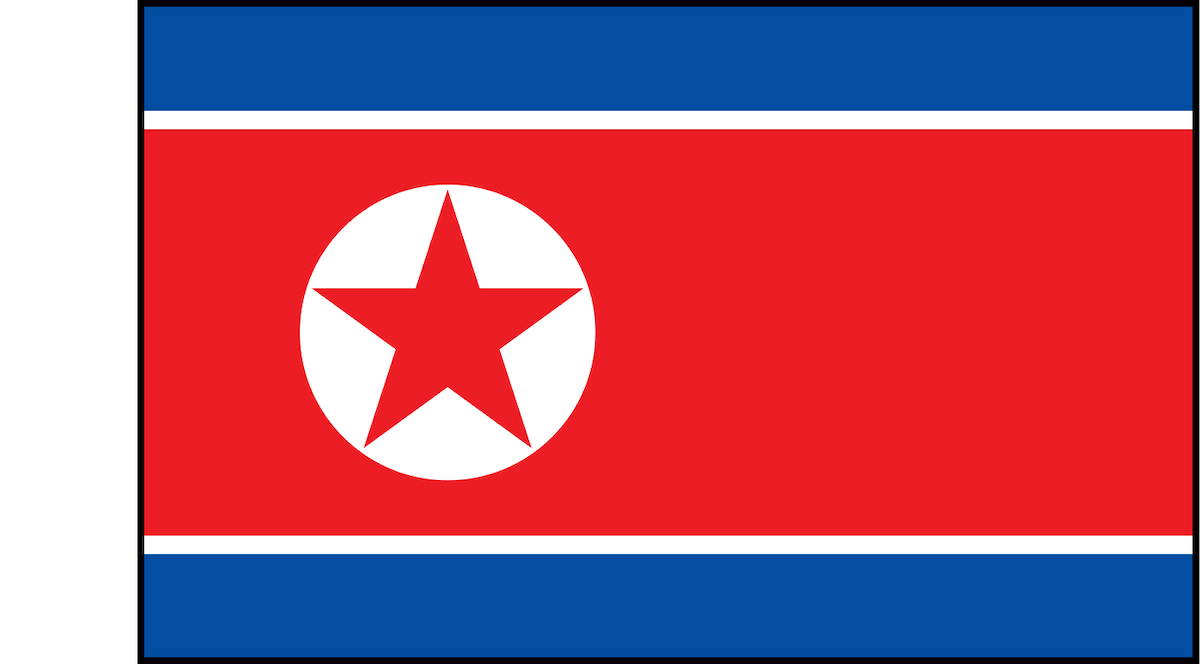 Flag of North Korea featuring a red star in a white circle, red background with blue and white borders, horizontal layout, symbolizing the national emblem and identity.