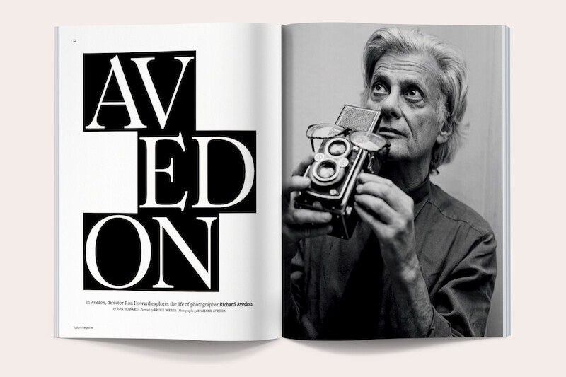 Magazine spread showing "AVEDON" in bold text on left and a black-and-white portrait of an older man holding a vintage camera on right, set against a neutral background.