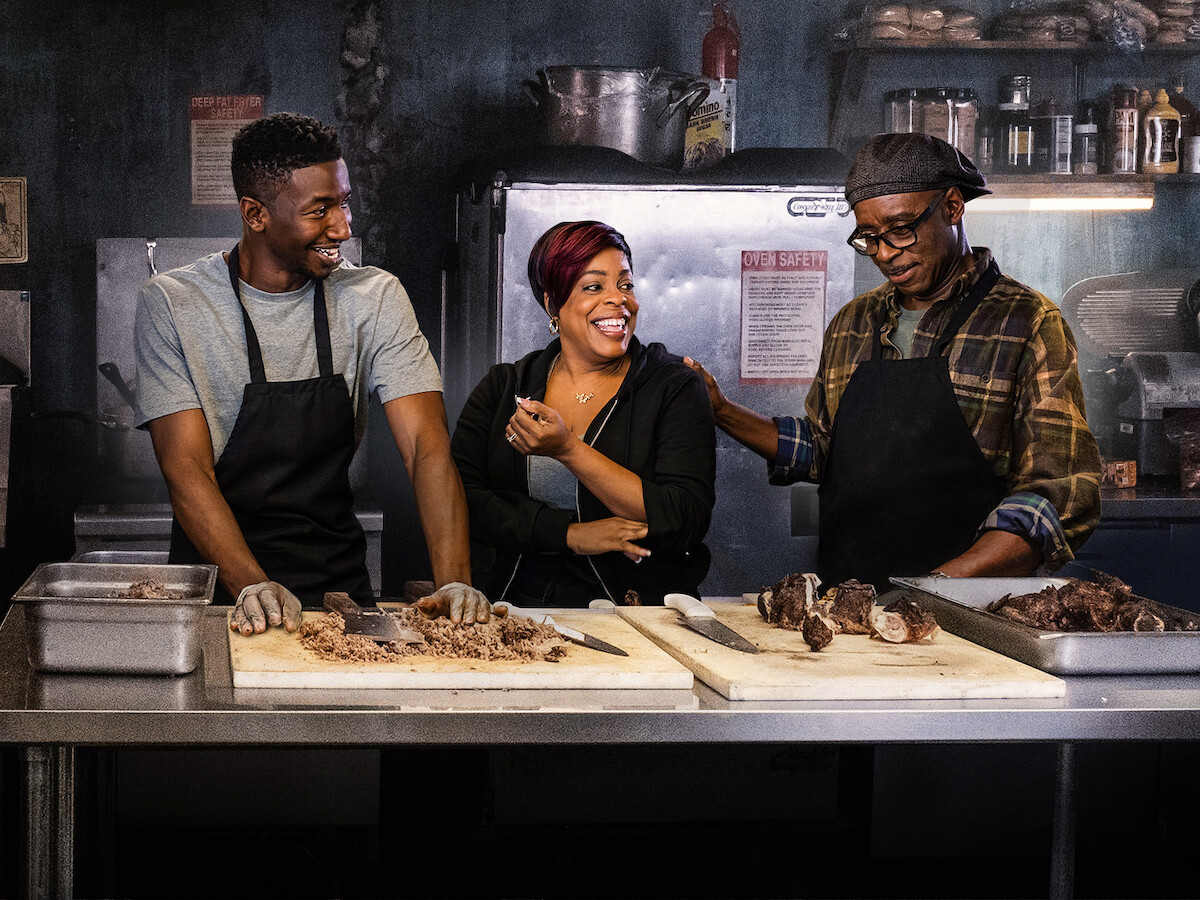 Mamoudou Athie playing a character working to be a sommelier in Uncorked