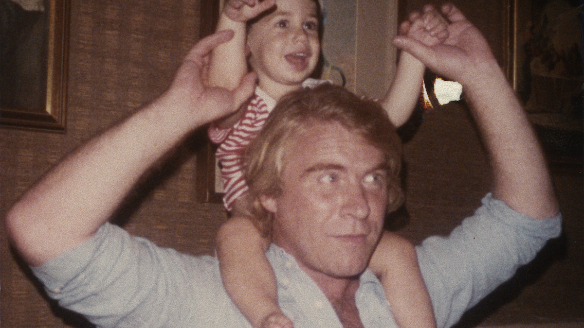 Danny Casolaro holding a child on his shoulders in ‘American Conspiracy: The Octopus Murders’