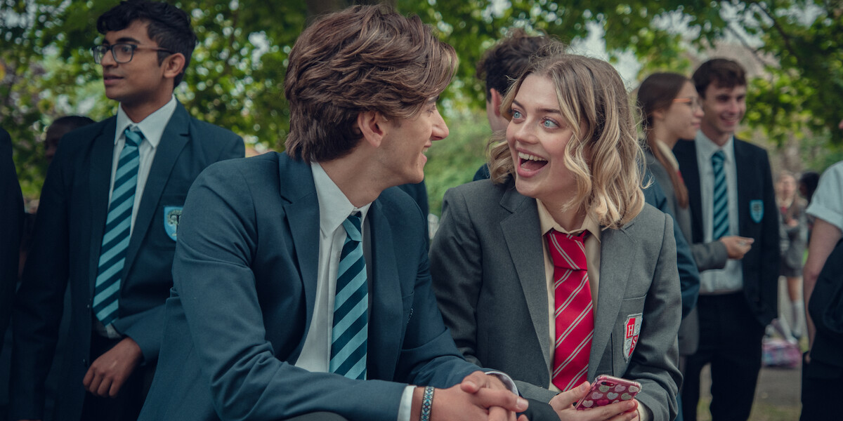 Sebastian Croft as Ben and Rhea Norwood as Imogen look at each other smiling in Season 2 of ‘Heartstopper.’