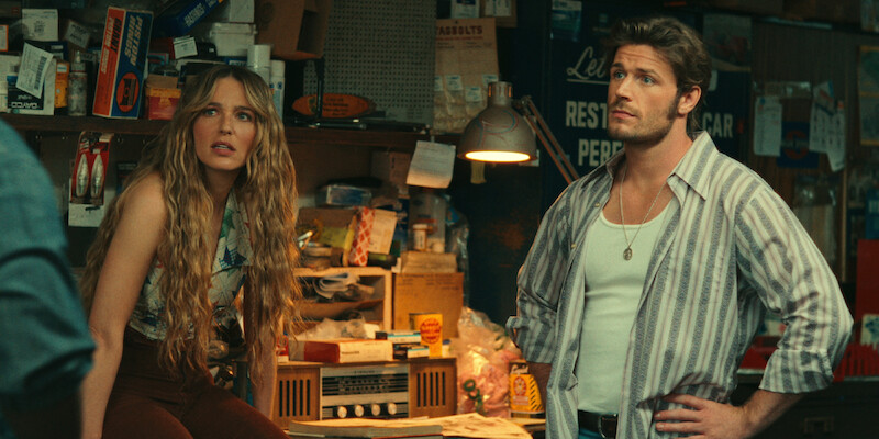 Jessica Rothe as Sarah and Callum Kerr as Everett sit in a workshop in Season 6 of 'Virgin River'