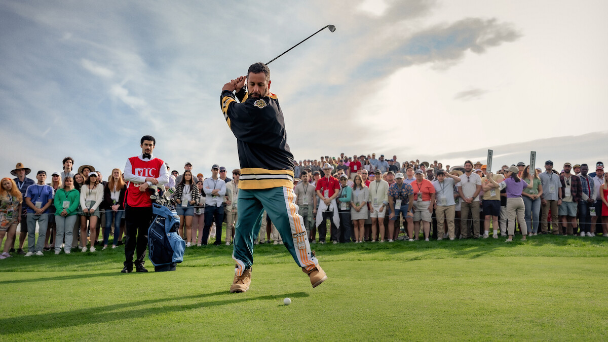 Benito Antonio Martínez Ocasio as Busboy and Adam Sandler as Happy Gilmore in 'Happy Gilmore 2'.