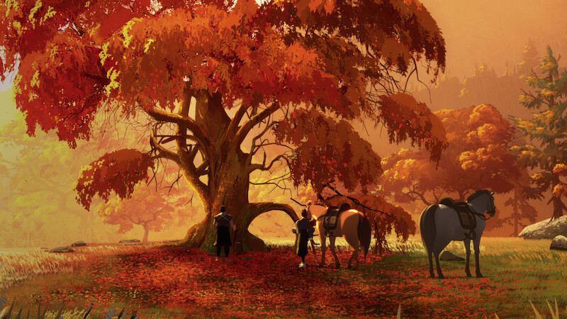 Autumn scene with a large tree with orange leaves.