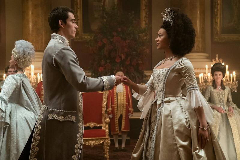 Corey Mylchreest as young King George and India Ria Amarteifio as young Queen Charlotte.