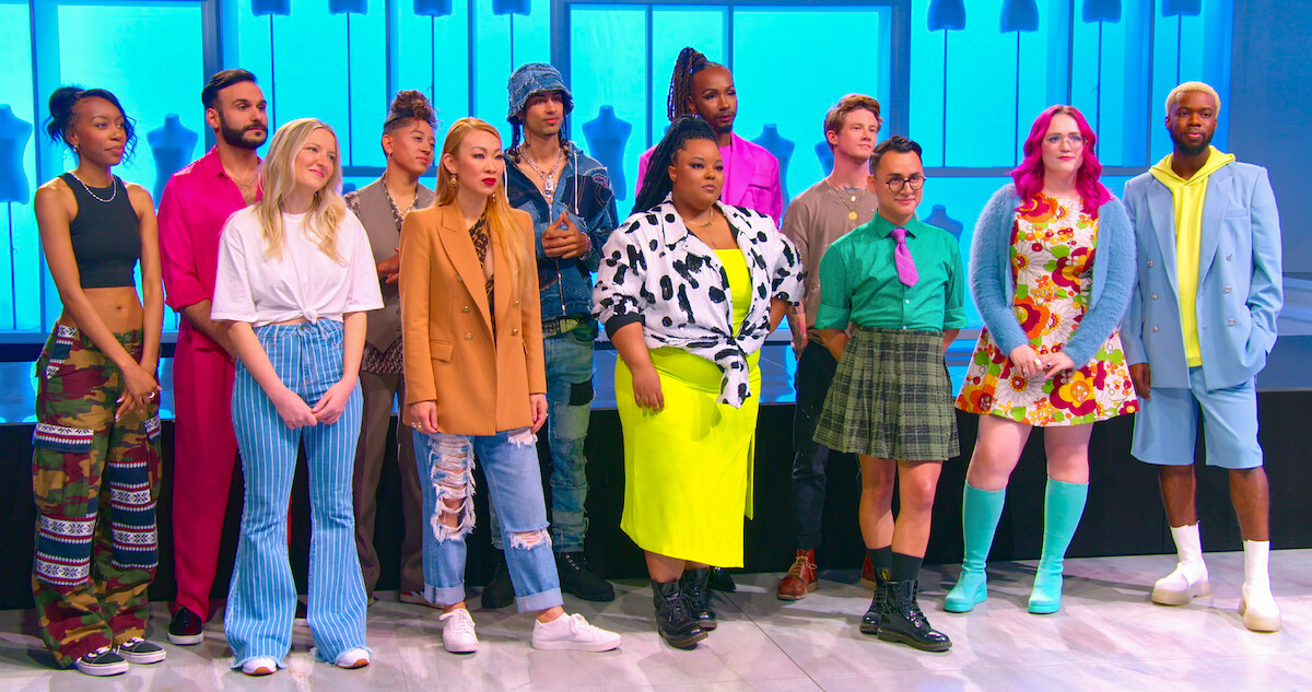 The cast of Next in Fashion stands before the judges