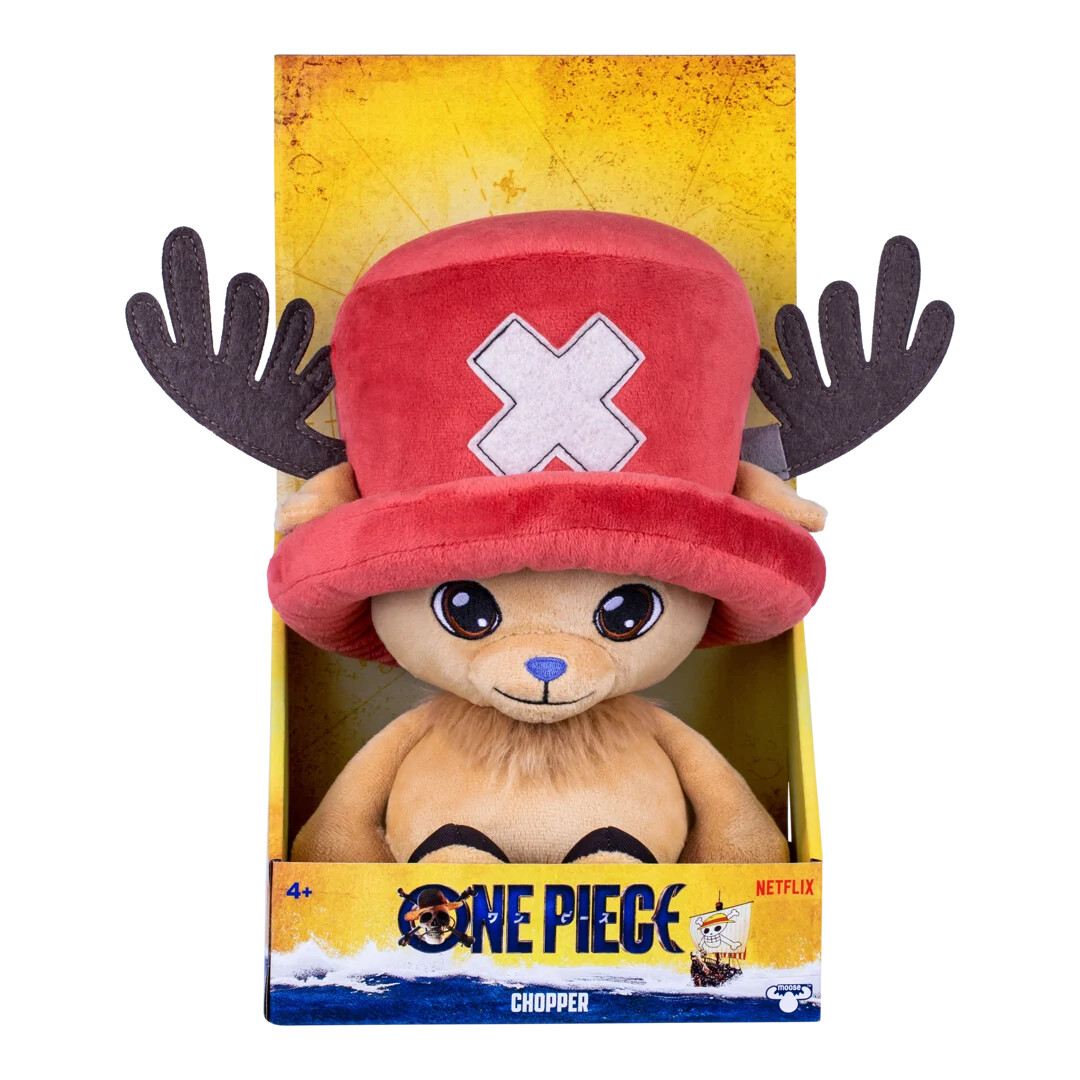 Plush toy of Chopper from One Piece with a red hat and antlers, displayed in a yellow retail box featuring Netflix and One Piece branding.