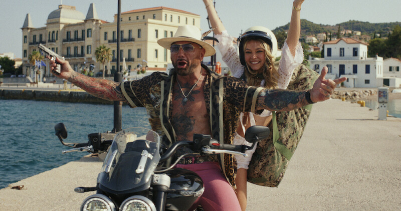 Dave Bautista and Madelyn Cline make their grand entrance.