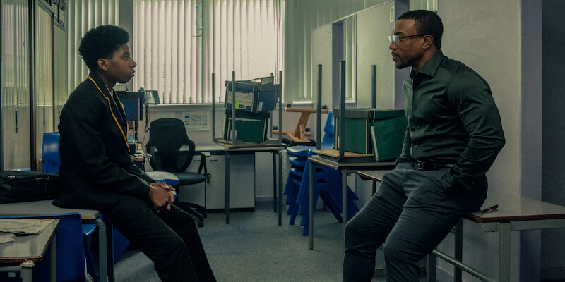 Amari Jayden Bacchus as Adam Bascombe, Ashley Walters as Detective Inspector Bascome, in 'Adolescence'