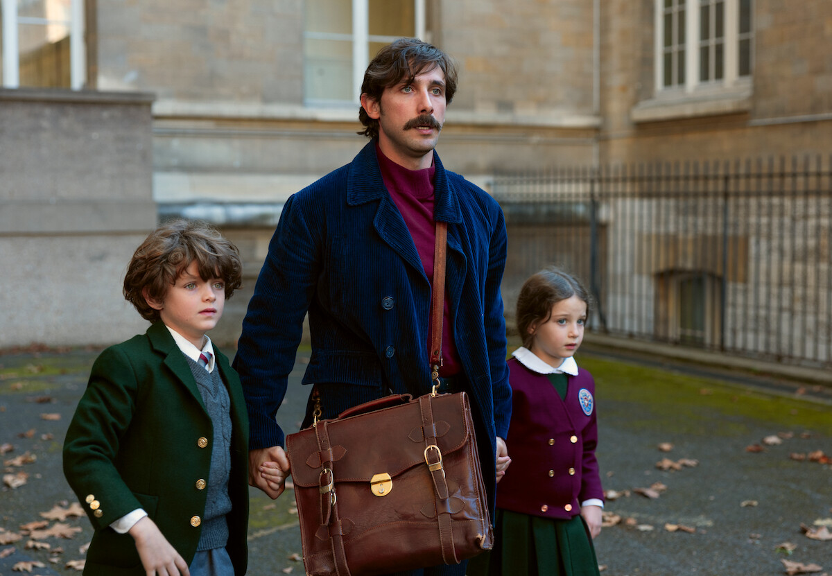 Alexander Varela as Isaac, Emiliano Zurita as Leo, Marion Sirot as Tamara walk through French streets on the way to school in ‘No One Saw Us Leave.’