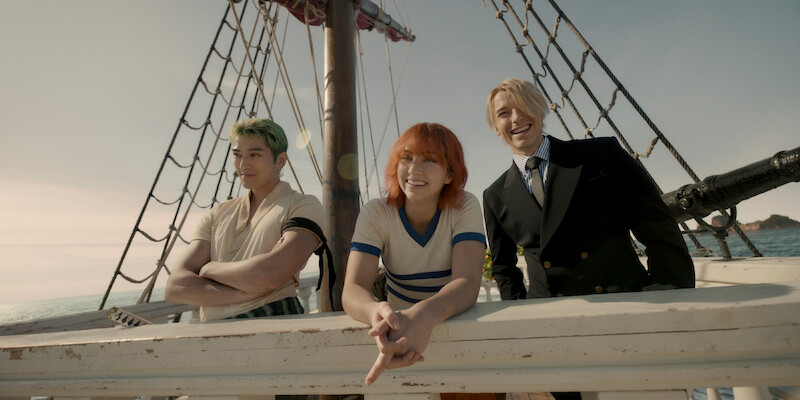  (L to R) Mackenyu Arata as Roronoa Zoro, Emily Rudd as Nami, Taz Skylar as Sanji
