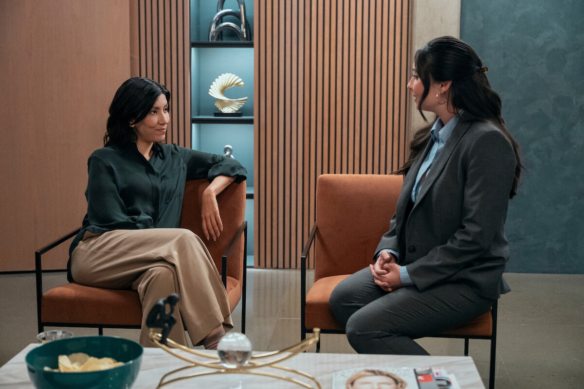 Stephanie Beatriz as Didi and Lilah Richcreek Estrada as Julie in ‘A Man on the Inside’ Season 2.