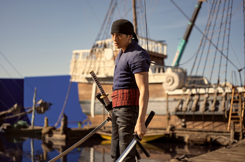 Mackenyu as Roronoa Zoro stands on a pirate ship set in Season 1 of 'One Piece.'