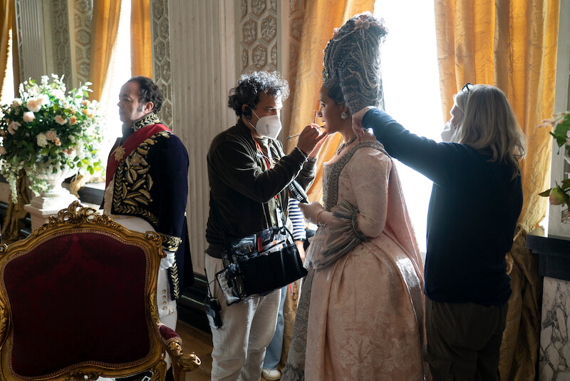 Sam Clemmett as Young Brimsley, Hair and Make Up Assistant Designer Giorgio Galliero, Golda Rosheuvel as Queen Charlotte, Hair and Make Up Designer Nic Collins