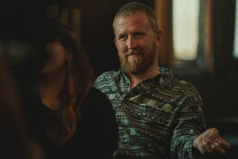 Tom Goodman-Hill wears a green shirt in 'Baby Reindeer'