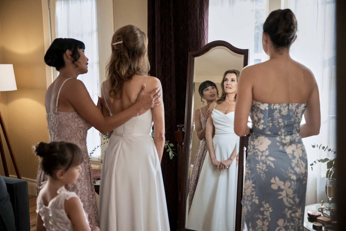 Rachel Lynch as Romi, Stephanie Sy as Sandy Yoon, Fabiana Udenio as Tally Brunner and Monica Barbaro as Emma Brunner in FUBAR Season 1.