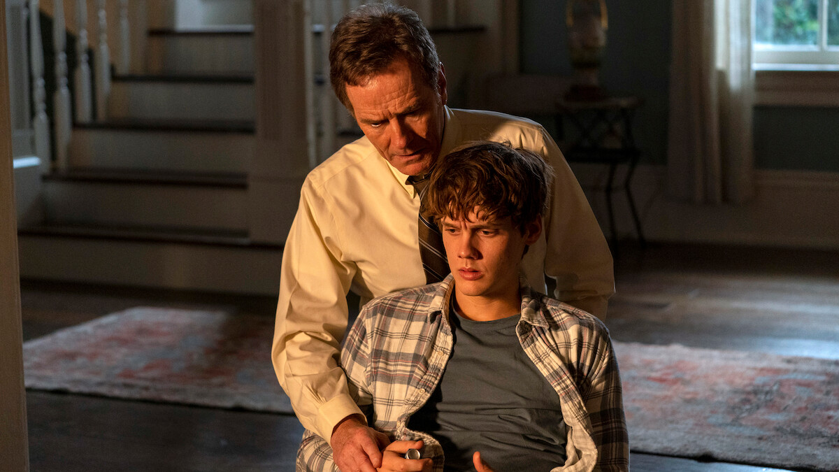 Bryan Cranston as Michael Desiato comforts Hunter Doohan as Adam Desiato in Season 1 of ‘Your Honor’