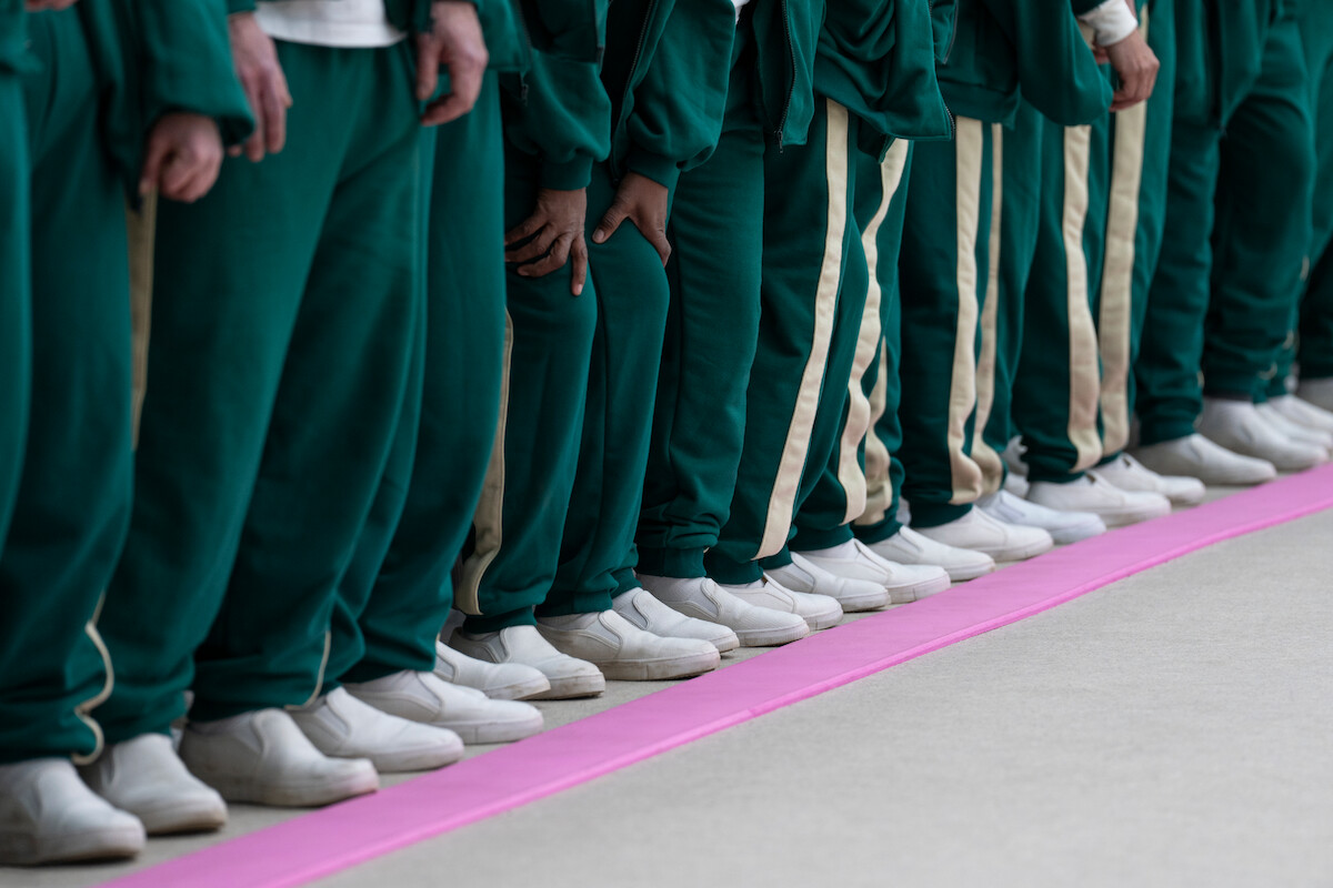 ‘Squid Game: The Challenge’ contestants in their tracksuits.