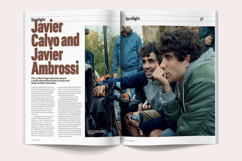 Two men sit closely together behind a monitor, intently watching on an outdoor film set. It's a magazine spread with large headline text, an article, and the subjects spotted in a candid, creative setting with equipment visible.