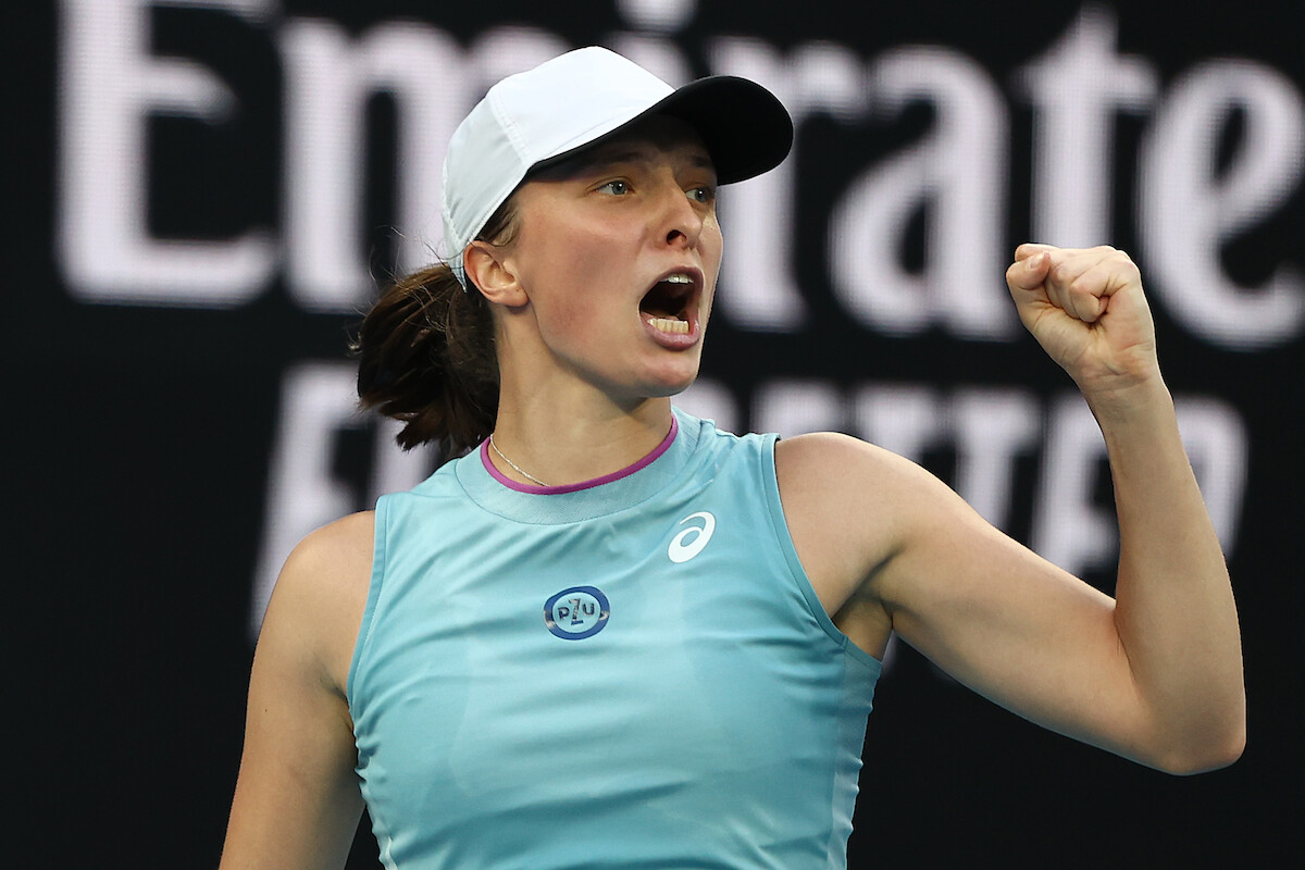 Iga Świątek celebrates after winning match point in her Women's Singles second round match against Camila Giorgi.