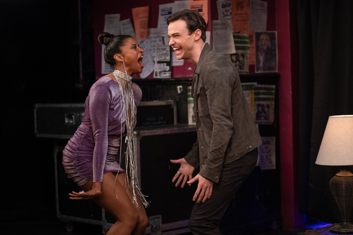 Renée Elise Goldsberry as Wickie and Thomas Doherty as Gray Holland scream with excitement together in Season 3 of ‘Girls5eva’.