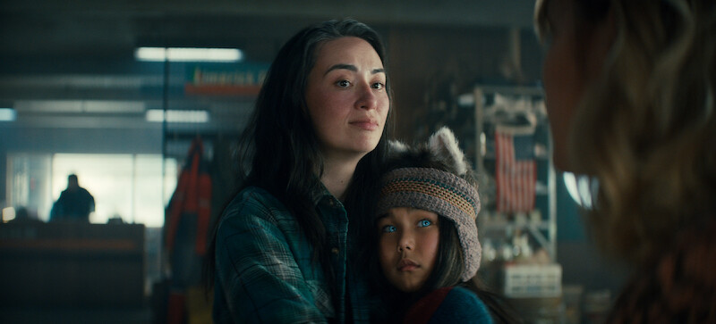 Cara Gee as Siana and Ayazhan Dalabayeva as Nuka embrace in Season 3 of 'Sweet Tooth'