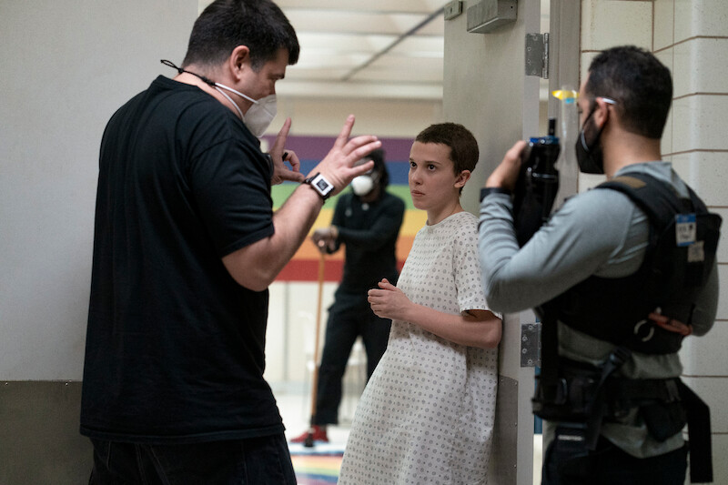 Brown knows nothing good ever happens in the rainbow room. - 68 Behind-the-Scenes pics from ‘Stranger Things’ Season 4 You Have to See Slideshow