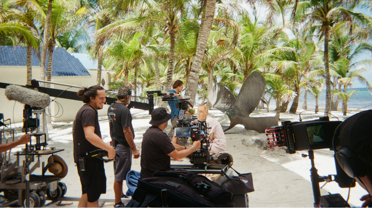 Behind-the-scenes photograph, showing the production crew and camera set-up