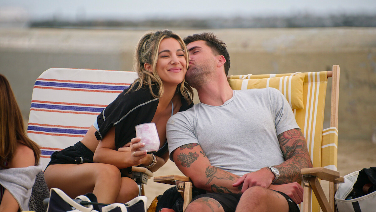 Tyler Stanaland kisses Alex Hall on the cheek
