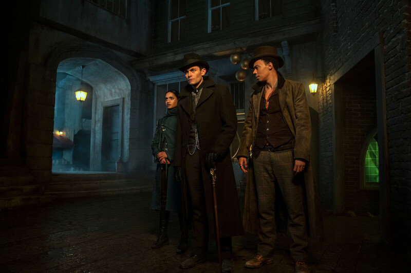 Amita Suman as Inej Ghafa, Freddy Carter as Kaz Brekker and Kit Young as Jesper Fahey in Season 2 of Shadow and Bone.
