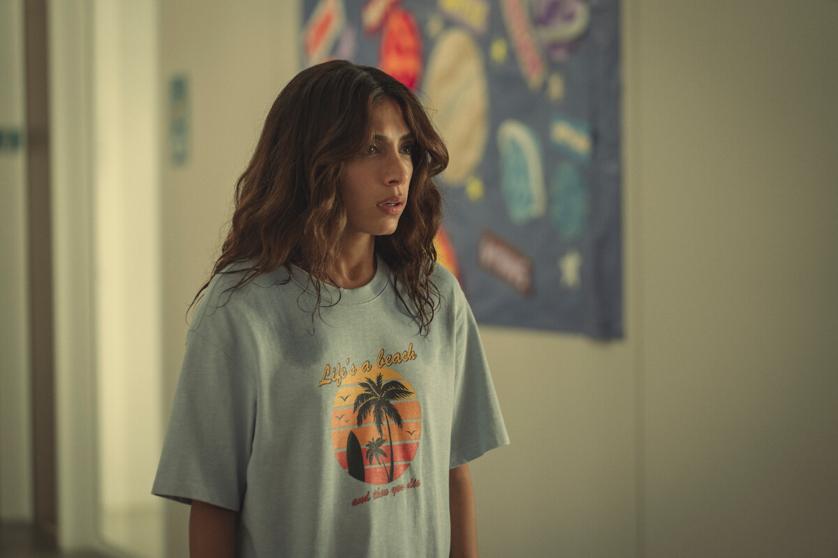 Evin Ahmad as Erin Carter looks out of frame in ‘Who is Erin Carter?’