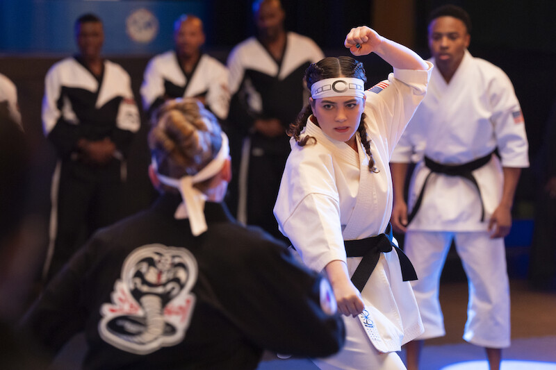 Mary Mouser as Samantha LaRusso fights an opponent in a competition in Season 6, Part 2 of 'Cobra Kai'