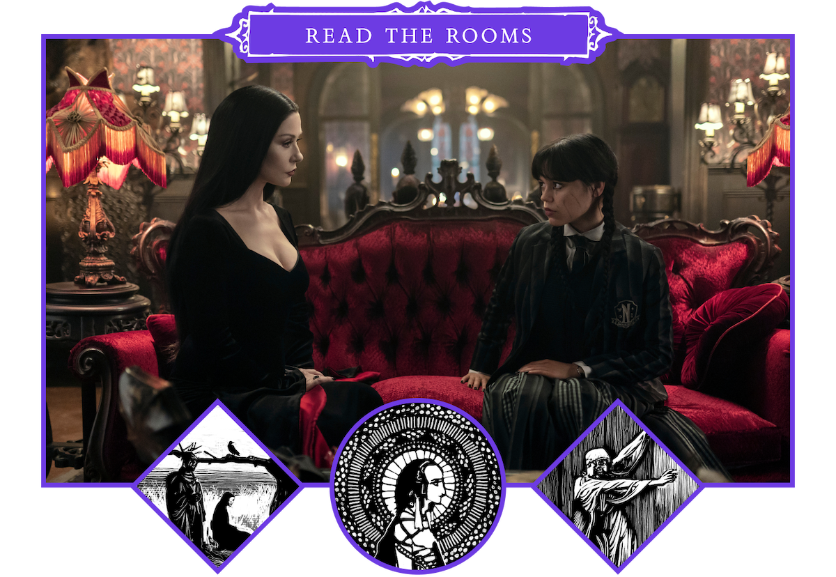 Catherine Zeta-Jones as Morticia Addams and Jenna Ortega as Wednesday Addams sitting on a red sofa in ‘Wednesday’ Season 2.