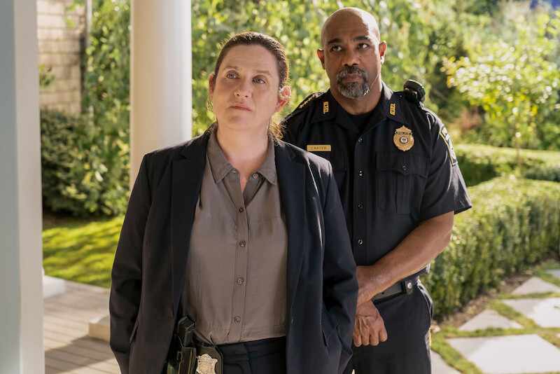 Donna Lynne Champlin as Nikki Henry and Michael Beach as Dan Carter.