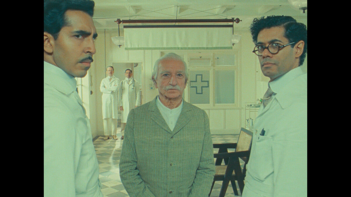 Dev Patel as Dr. Chatterjee, Sir Ben Kingsley as Imdad Khan, and Richard Ayoade as Dr. Marshall in Roald Dahl's ‘The Wonderful Story of Henry Sugar’