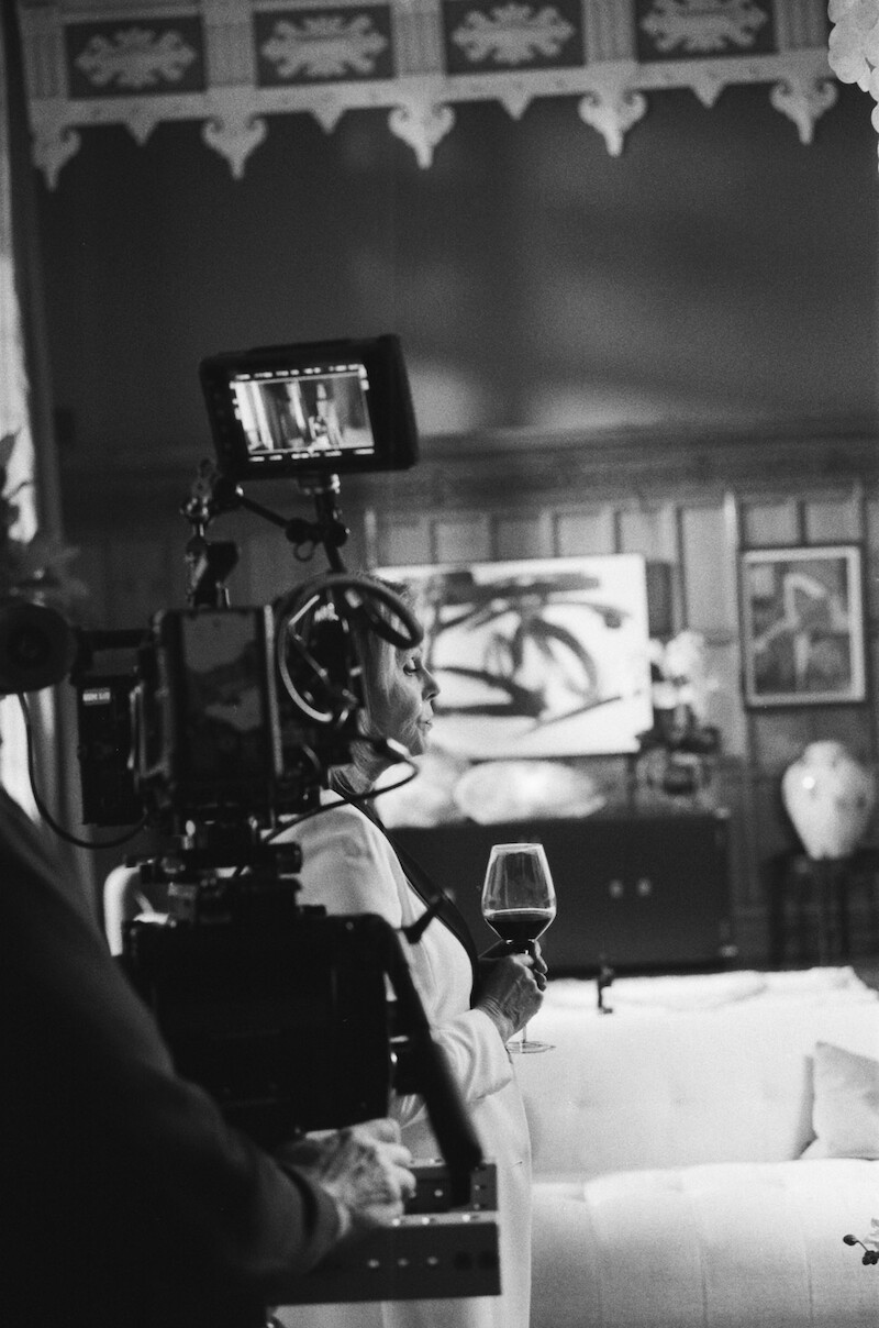 Black-and-white image of the crew filming on set of Season 1 of 'Fool Me Once' 