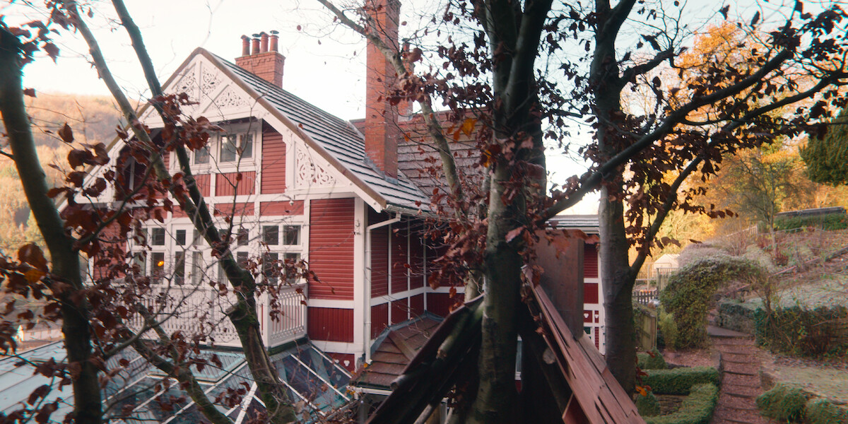 An exterior view of Otis and Jean’s chalet-style house.