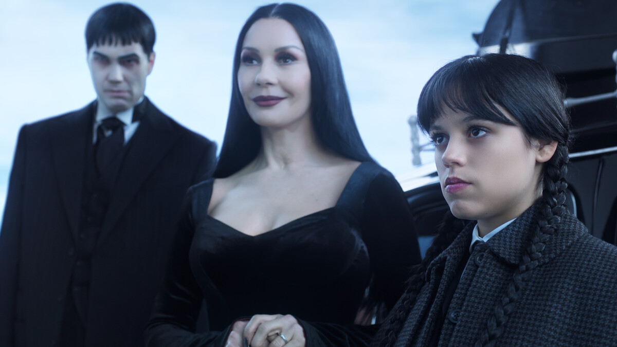 Joonas Suotamo as Lurch, Catherine Zeta-Jones as Morticia Addams, and Jenna Ortega as Wednesday Addams in Season 2 of 'Wednesday'