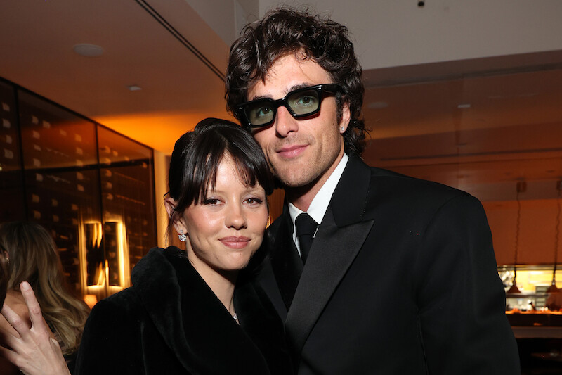 Mia Goth and Jacob Elordi pose for a photo.