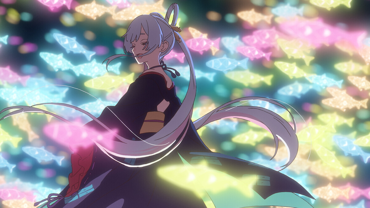 Woman surrounded by holographic fish in Cosmic Princess Kaguya!