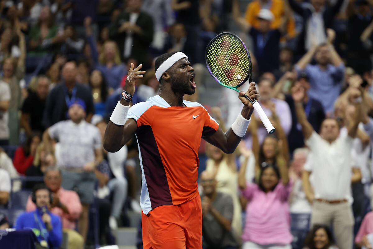 Frances Tiafoe celebrates a break point.