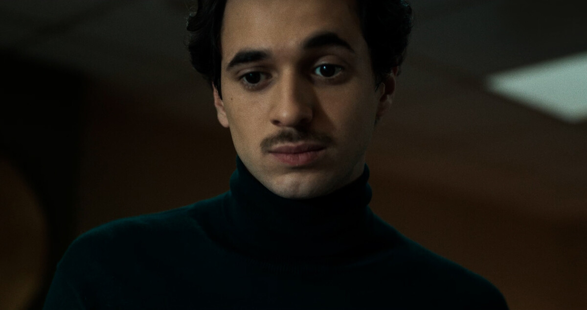 Crypto boy - Man with a mustache wearing a turtleneck