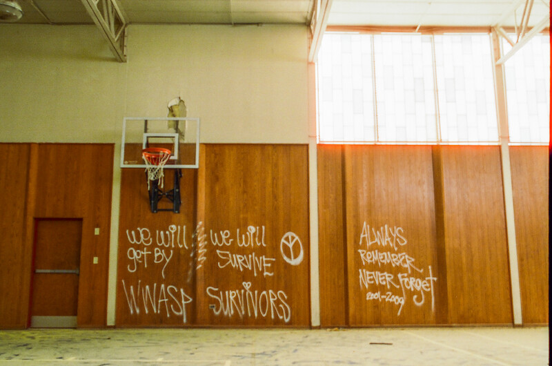 Graffiti wall at Ivy Ridge that reads "Always remember, never forget."
