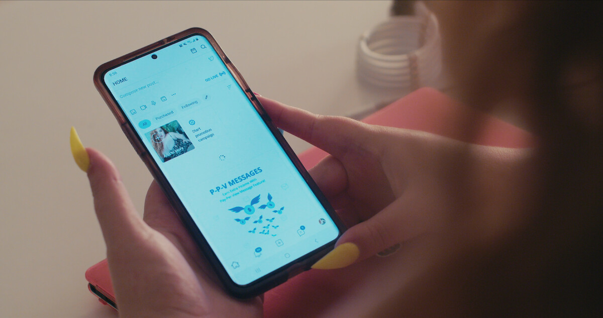 a woman looking at her phone screen