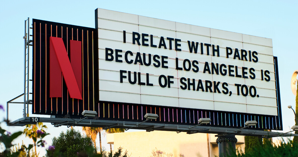 Under Paris Sunset Blvd Marquee - ‘I relate with Paris because Los Angeles is filled with sharks, too.’
