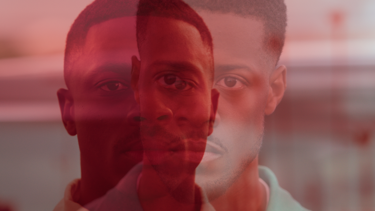 Red tinted image of Vince Staples as Vince Staples and Patrick Walker as White Boy in Season 1 of ‘The Vince Staples Show’