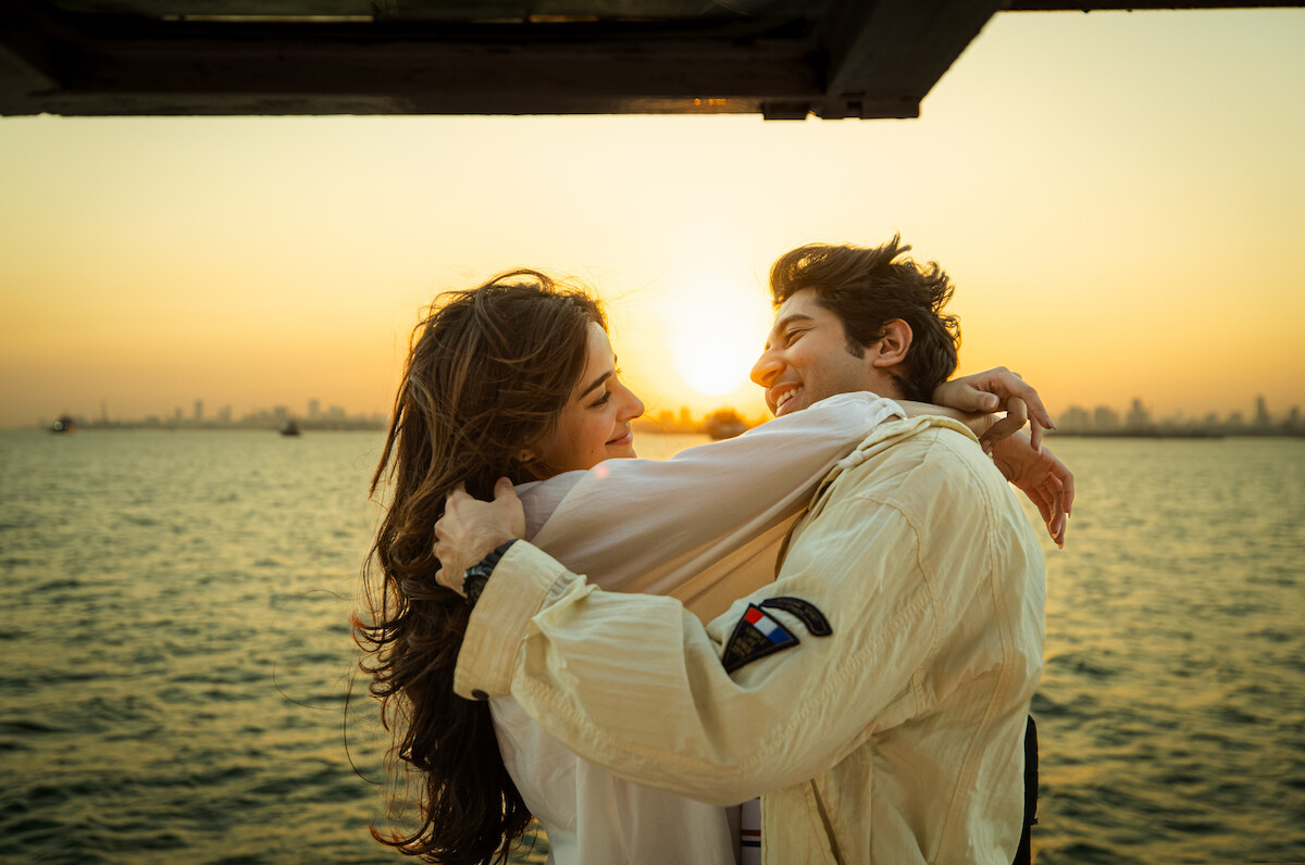 Ananya Panday as Nella Awasthi and Vihaan Samat as Joe Mascarenhas hug in front of a body of water in an image from the movie ‘CTRL.’