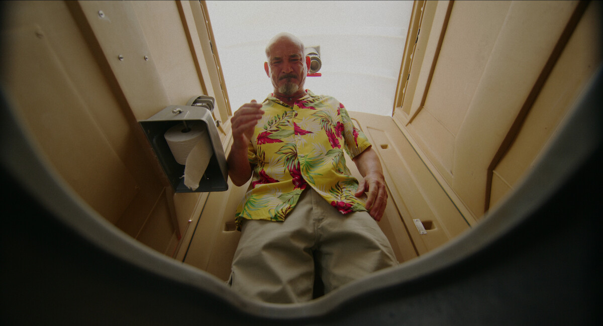 Man drops cell phone in Porta-Potty in ‘Florida Man’ Season 1.