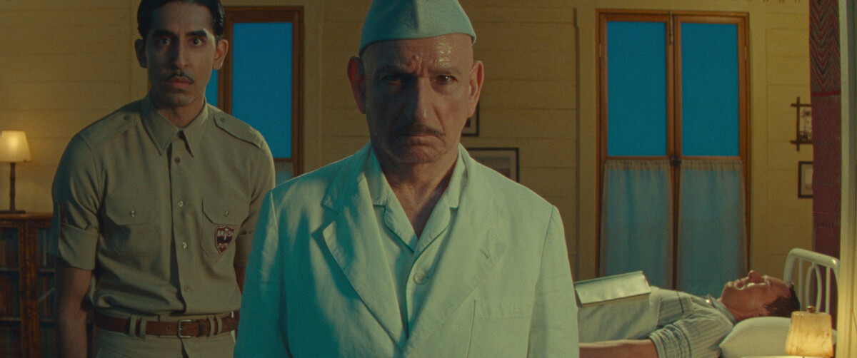 Dev Patel as Woods and Ben Kingsley as Dr. Ganderbai in a still from ‘Poison.’
